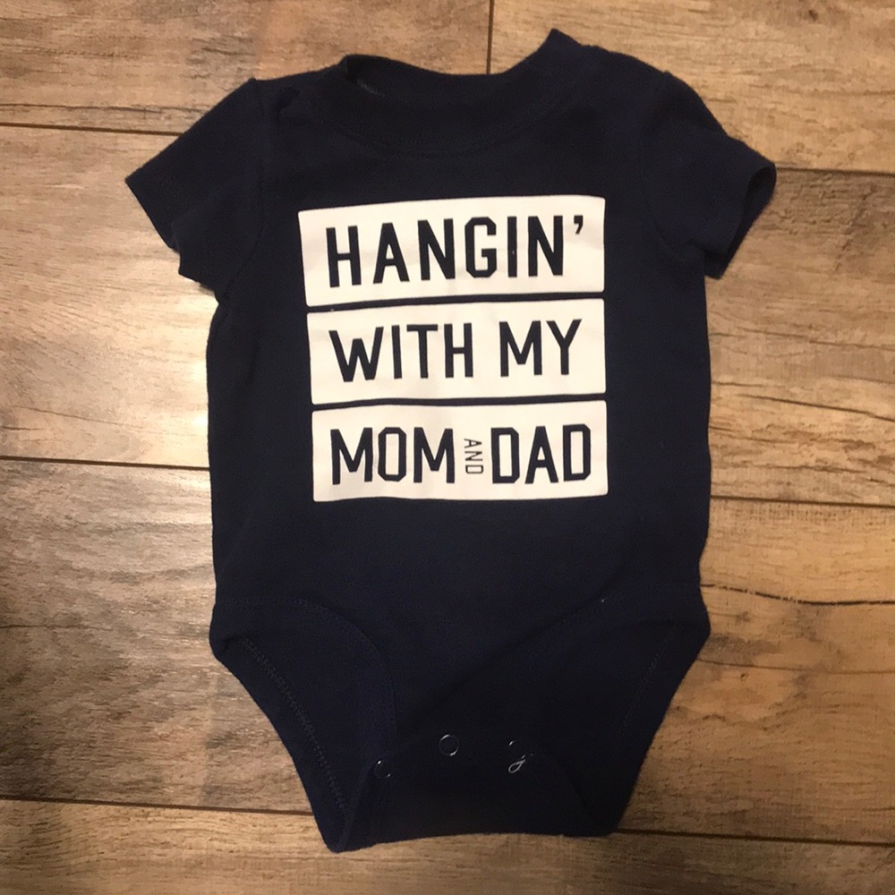 Carter’s body suit hanging with my mom and dad